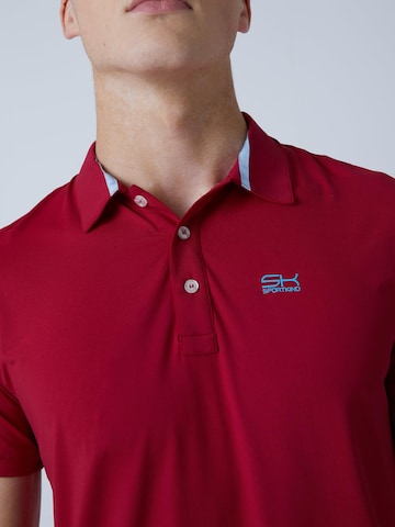 T-Shirt fonctionnel 'Polo' SPORTKIND en rouge