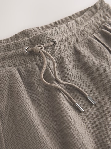 Next Regular Hose in Braun