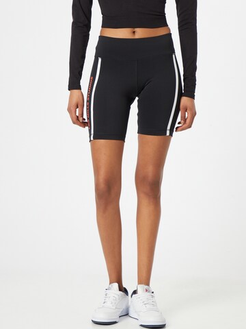 Reebok - Skinny Pantalón deportivo en negro: frente