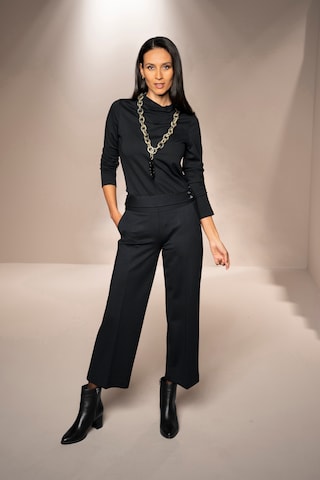 Wide leg Pantaloni di heine in nero