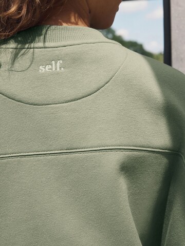 self. Sweatshirt in Groen