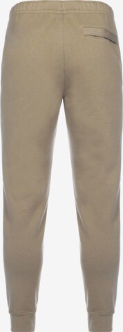 Tapered Pantaloni 'Club Fleece' di Nike Sportswear in beige