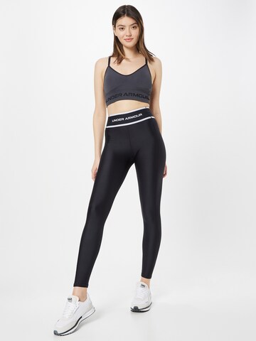 UNDER ARMOUR Skinny Sportbroek 'HeatGear' in Zwart