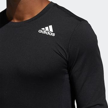 ADIDAS SPORTSWEAR - Camisa funcionais em preto