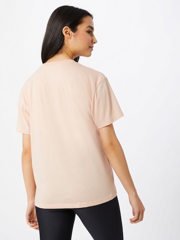 UNDER ARMOUR Λειτουργικό μπλουζάκι σε ροζ