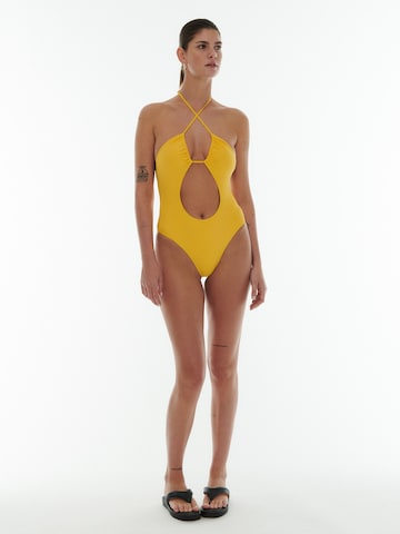 ABOUT YOU x Laura Giurcanu Triangle Swimsuit 'Valentina' in Yellow