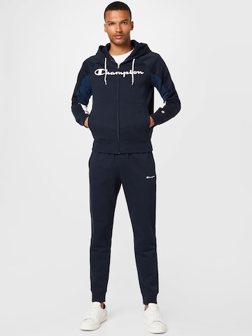 Champion Authentic Athletic Apparel Tracksuit in Black: front