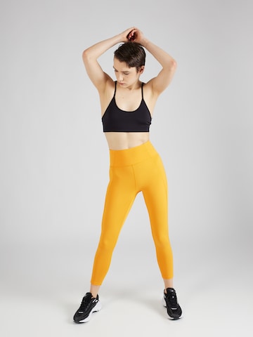 Regular Pantalon de sport Girlfriend Collective en jaune