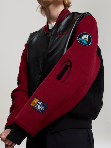 AND1 Přechodná bunda 'Respect The Game' – černá