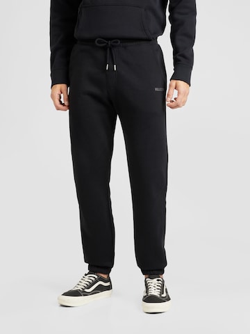 HOLLISTER Tapered Pants in Black: front