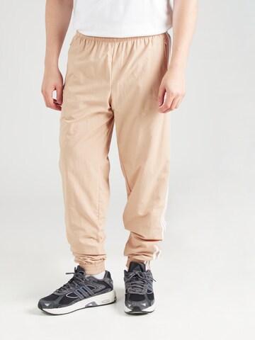 Tapered Pantaloni 'Adicolor Firebird' di ADIDAS ORIGINALS in beige: frontale