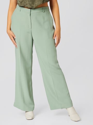 A LOT LESS Wide leg Trousers with creases 'Daliah' in Green: front