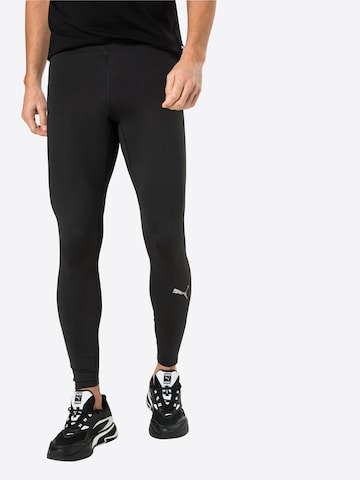 PUMA Skinny Workout Pants in Black: front