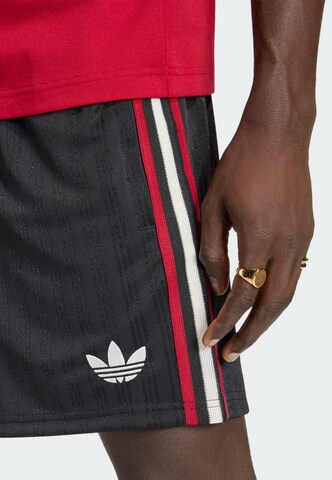ADIDAS PERFORMANCE - Loosefit Pantalón deportivo 'Manchester United Originals' en negro