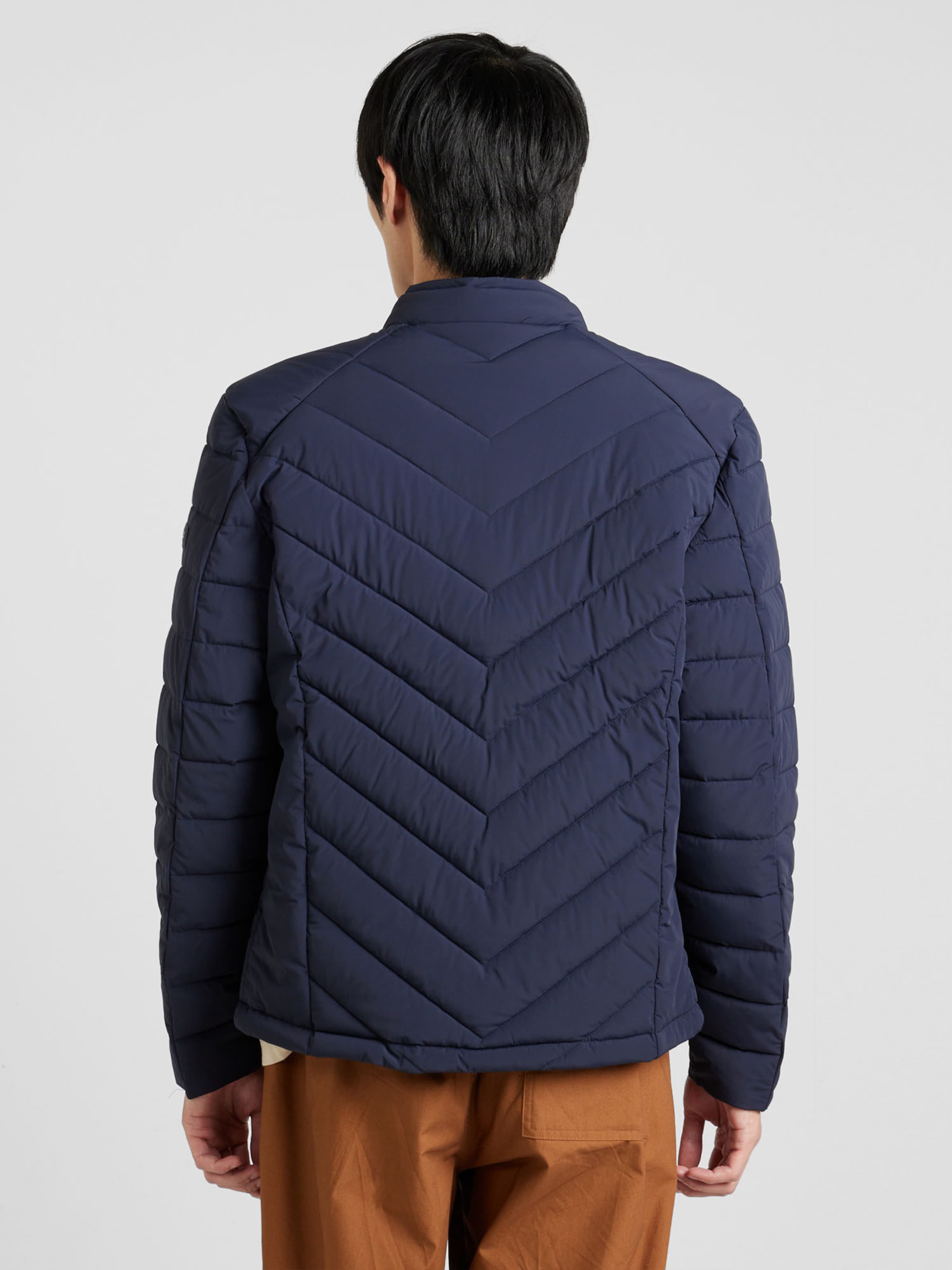 GUESS Between season jacket in Navy ABOUT YOU