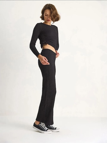 Pantalons de tailleur Bianco Lucci en noir