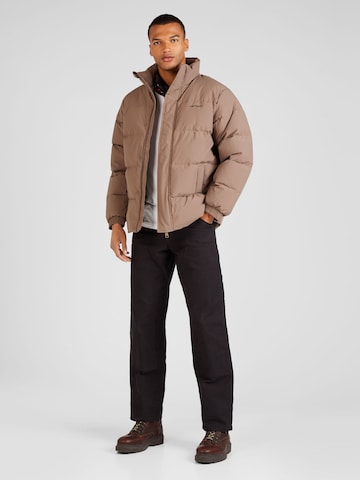 Carhartt WIP Winterjas 'Danville' in Bruin