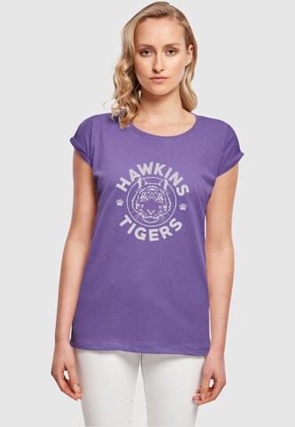 ABSOLUTE CULT T-Shirt 'Stranger Things - Hawkins Tiger' in Lila: Vorderseite