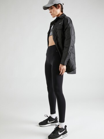 NIKE Skinny Sportbroek 'ZENVY' in Zwart