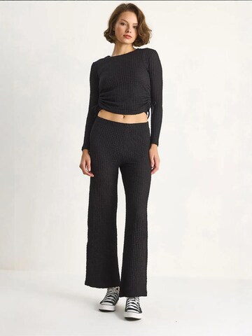 Pantalons de tailleur Bianco Lucci en noir : devant