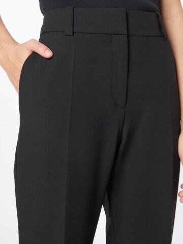 Wide leg Pantaloni con piega frontale 'Hovani' di HUGO in nero