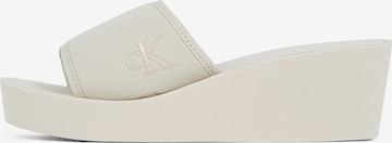 Saboți de la Calvin Klein Jeans pe alb: față