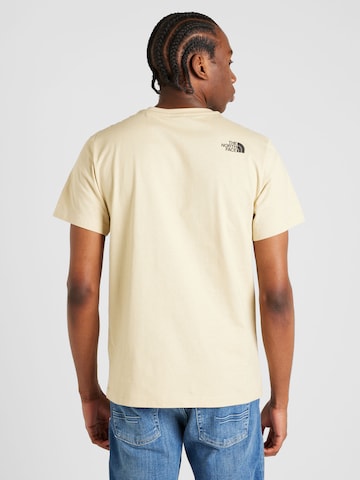 THE NORTH FACE - Camiseta en beige