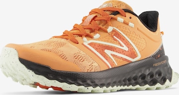 Chaussure de course 'Garo' new balance en orange : devant