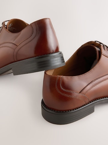 Next Čevlji na vezalke | rjava barva