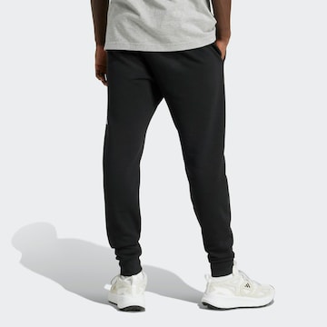 ADIDAS SPORTSWEAR regular Παντελόνι φόρμας 'Essential' σε μαύρο