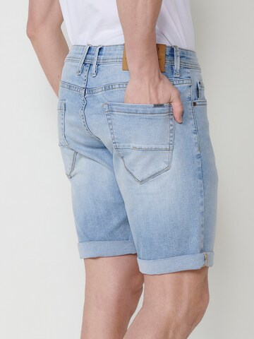 Slimfit Jeans di KOROSHI in blu