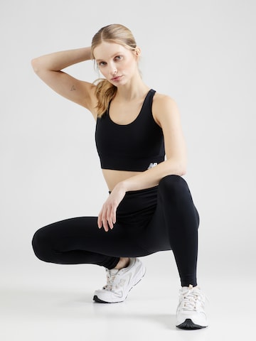 new balance - Soutien Bustier Soutien de desporto 'Tech' em preto