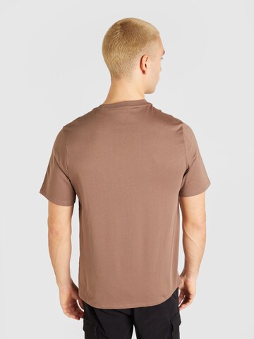 Reebok Shirt 'MOTION' in Braun