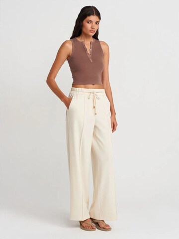 Dilvin Wide leg Pants in Beige