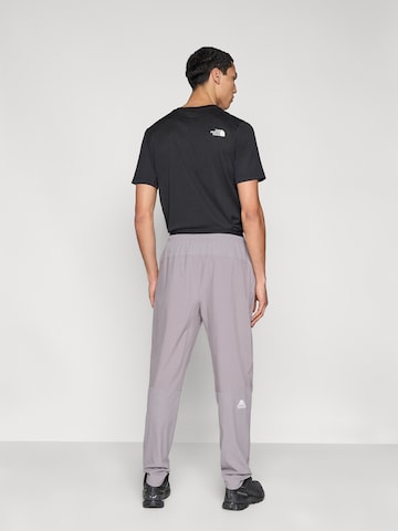 THE NORTH FACE Regular Ulkoiluhousut 'MOUNTAIN ATHLETICS' värissä harmaa