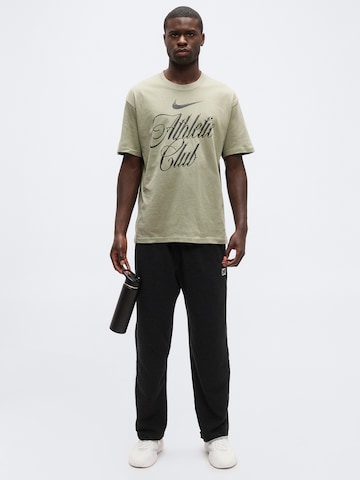 T-Shirt fonctionnel NIKE en vert