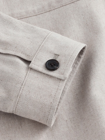 Next Tussenjas in Beige