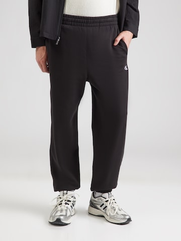 Calvin Klein Jeans Tapered Trousers '350TERRY' in Black: front