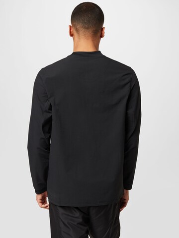 Reebok Λειτουργικό μπλουζάκι σε μαύρο