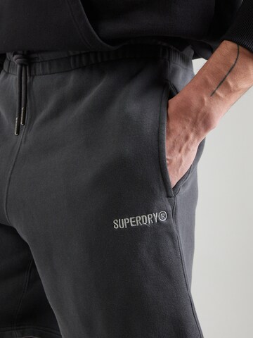 Superdry Свободный крой Штаны в Черный