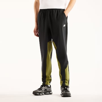 Regular Pantalon de sport 'Utility' new balance en noir : devant