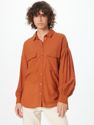 OUI - Blusa em laranja: frente