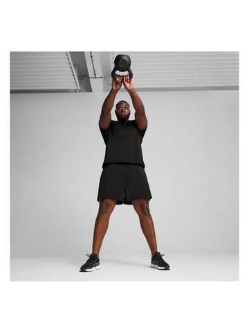 PUMA Shirt‌‌‌‌‌‌‌‌ in Schwarz