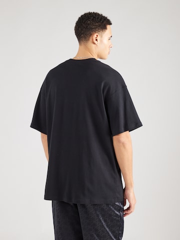 ELLESSE - Camisa 'Rocazzi' em preto