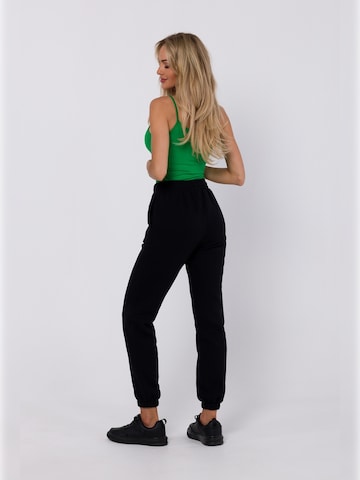 made of emotion Tapered Hose in Schwarz