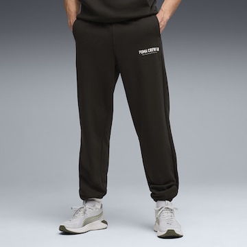 Effilé Pantalon de sport PUMA en noir : devant