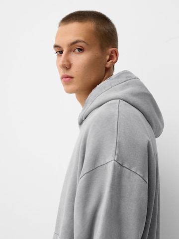 Felpa di Bershka in grigio
