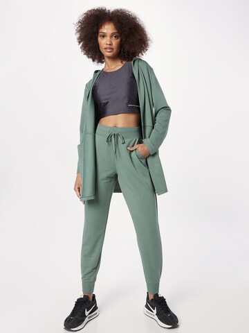 Effilé Pantalon de sport SKECHERS en vert