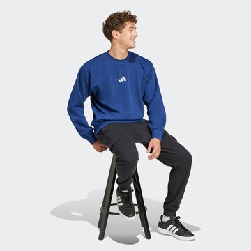 ADIDAS SPORTSWEAR Sports sweatshirt 'Feelcozy' in Blue