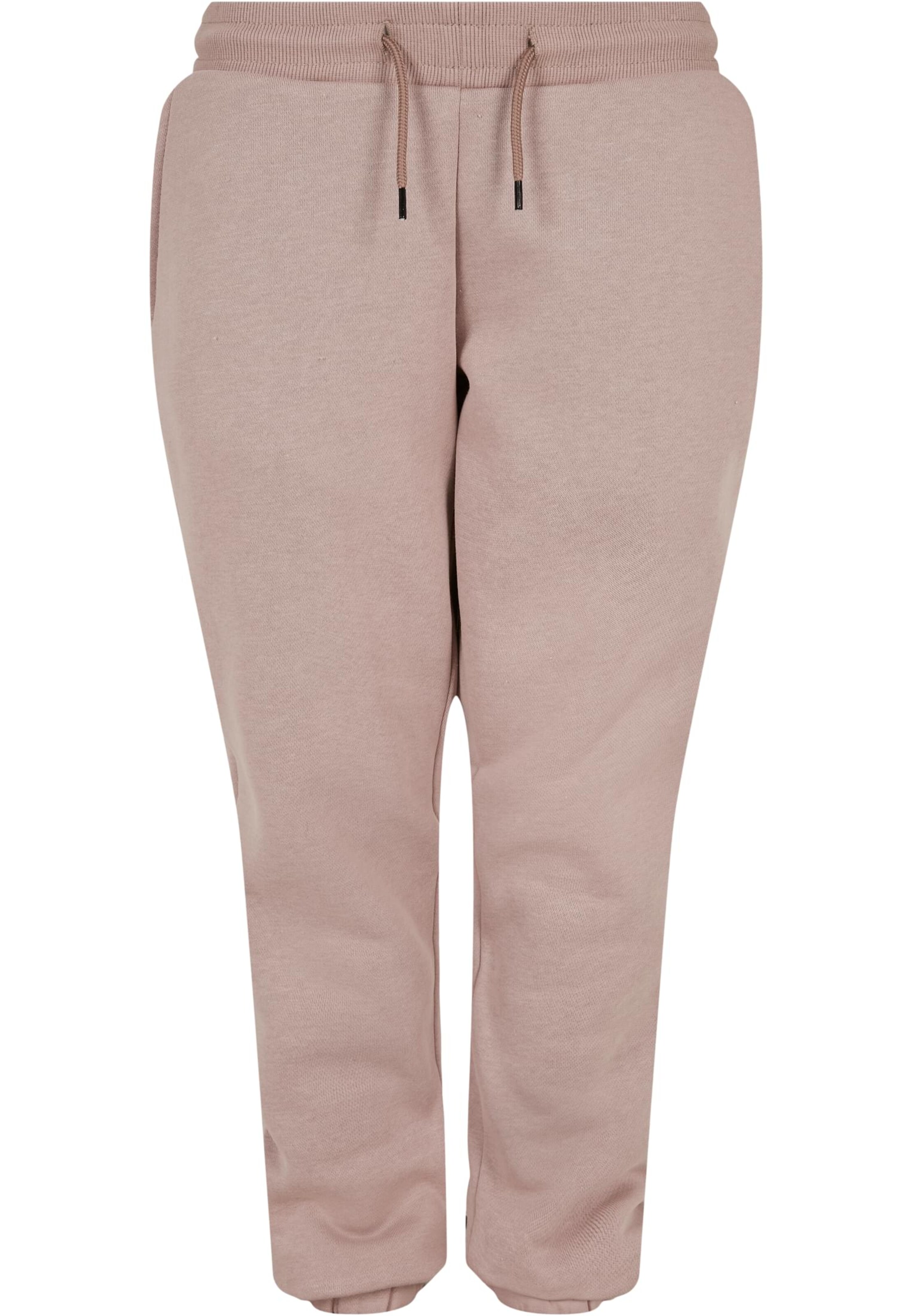 Urban Classics Tapered Housut värissä vaaleanpunainen: etupuoli